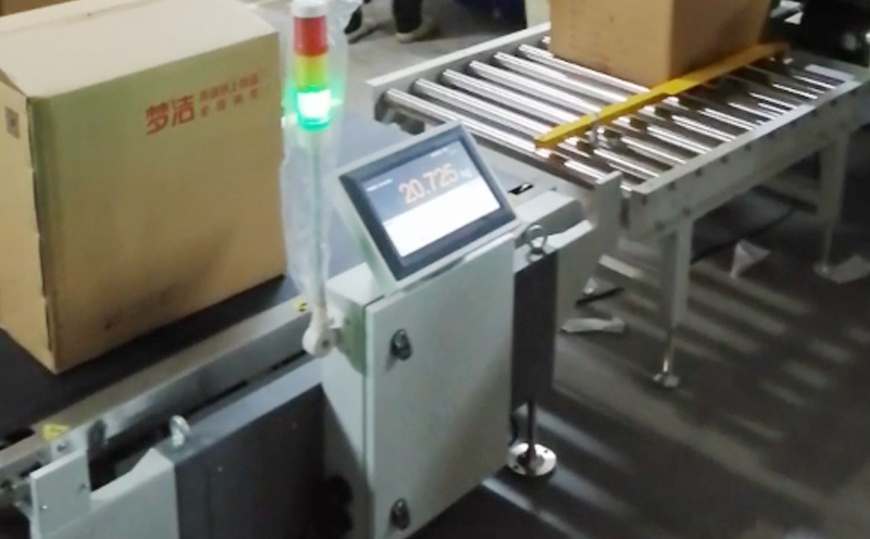 杰曼在線檢重秤助日化行業打造智能生產線-自動檢重機-稱重設備-杰曼科技